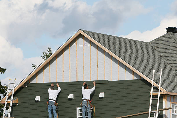 Professional Siding technician working in Ottsville, PA